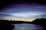image of noctilucent clouds shining at night 