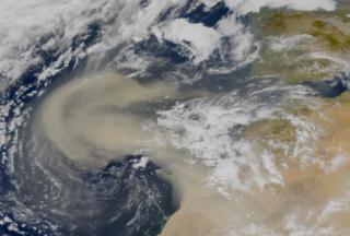 Large amounts of dust move westward from the African coast