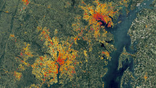 This Landsat data from 1986 of the Washington-Baltimore area, however a special algorithm has been applied to it to illuminate the changes in low-density residential land use which exemplify sprawl.