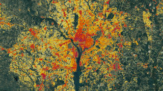 This Landsat data from 1986 of the Washington area, however a special algorithm has been applied to it to illuminate the changes in low-density residential land use which exemplify sprawl.