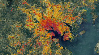 This Landsat data from 1986 of the Baltimore area, however a special algorithm has been applied to it to illuminate the changes in low-density residential land use which exemplify sprawl.
