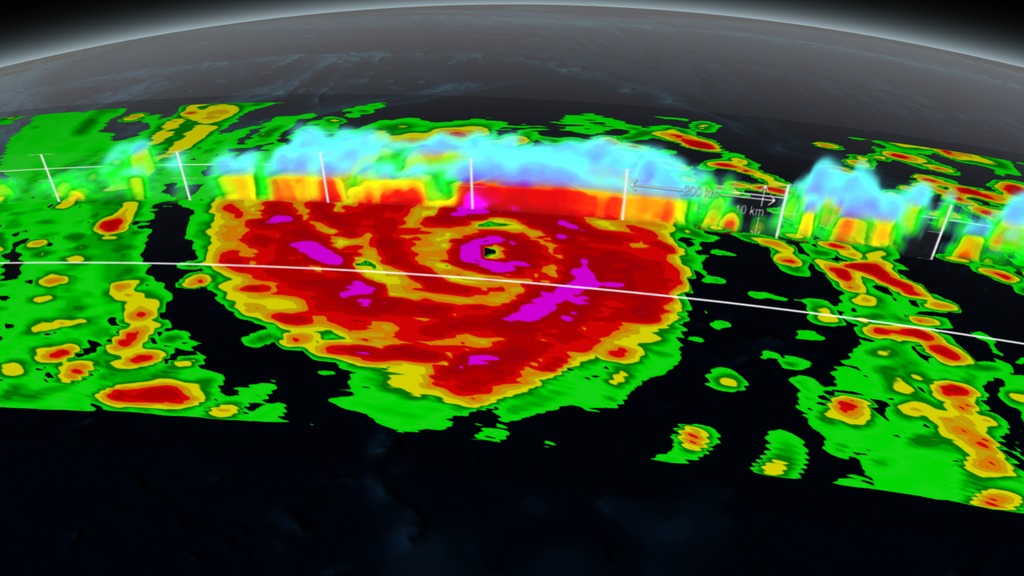 Animation revealing a swath of GPM/GMI precipitation rates over Typhoon Vongfong.  As the camera moves in on the storm, DPR's volumetric view of the storm is revealed.  A slicing plane moves across the volume to display precipitation rates throughout the storm. Shades of green to red represent liquid precipitation extending down to the ground. This video is also available on our YouTube channel.