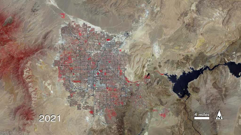 Timelapse animation of Lake Mead and the city of Las Vegas, Nevada, from 1972-2021, as captured by Landsat sensors. The images are false-color, showing healthy vegetation in red.