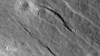 The largest of the newly detected graben found in highlands of the lunar farside. The broadest graben is about 500 m wide and topography derived from Lunar Reconnaissance Orbiter Camera (LROC) Narrow Angle Camera (NAC) stereo images indicates they are almost 20 m deep.   Credit:  NASA/GSFC/Arizona State University/Smithsonian Institution