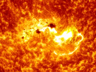 This closeup of the Sun taken by NASA's Solar Dynamics Observatory, shows large sunspot AR1944 and the source area of the X1.2 class solar flare, which appears to be from adjacent, smaller sunspot AR1943.Image Credit:NASA/SDO/Goddard Space Flight Center