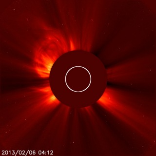 The second of two CMEs from the evening of Feb. 5, 2013, can be seen bursting away from the sun in the upper left hand side of this image, which was captured by the joint ESA/NASA mission the Solar Heliospheric Observatory (SOHO) at 11:12 p.m. EST.  The sun itself is obscured in this picture &mdash taken by an instrument called a coronagraph &mdash; so that its bright light doesn't drown out the picture of the dimmer surrounding atmosphere, called the corona. 