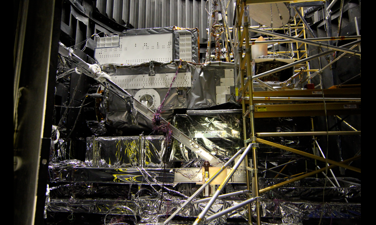 GPM being prepared to leave the thermal vacuum chamber. This is a view from the side with the MLI and cryo panels removed.Credit: NASA