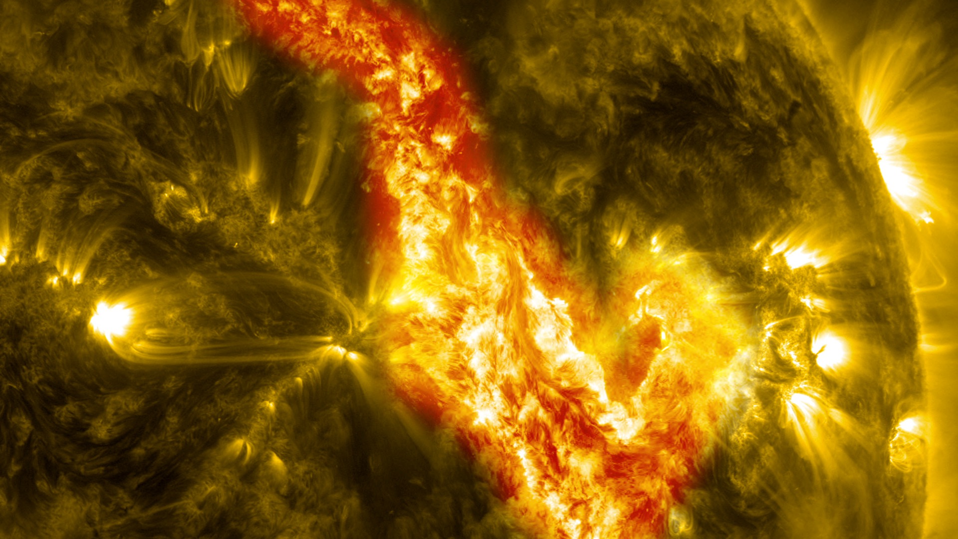Short video with music.  The image is a composite of SDO AIA 171 and 304, with the two wavelengths blended in the area of the canyon.Watch this video on the NASAexplorer YouTube channel.For complete transcript, click here.