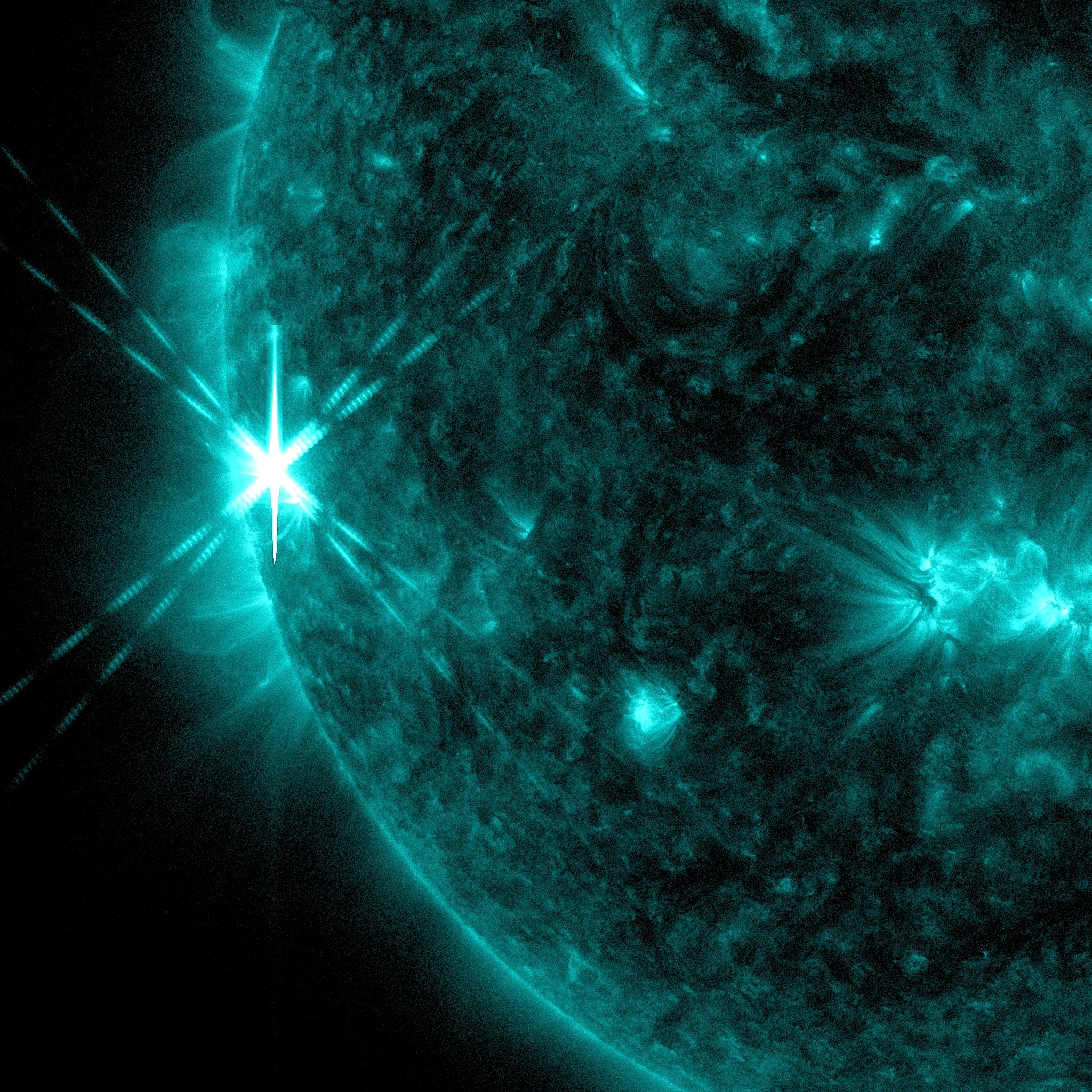 X1.7 flare from 4:01am EDT Oct 25 2013, viewed in SDO AIA 131.  Cropped.