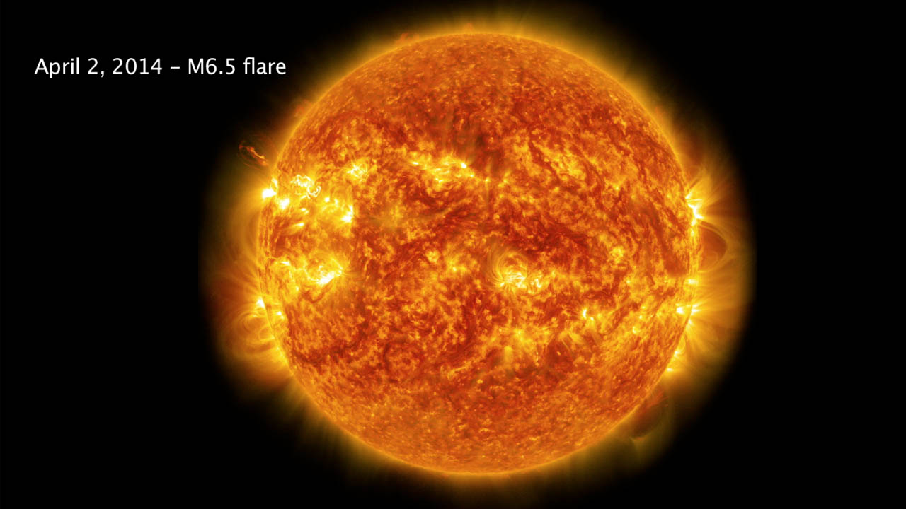 Watch this video on the NASAexplorer YouTube channel.A mid-level flare, an M6.5, erupted from the sun on April 2, 2014, peaking at 10:05 a.m. EDT. This image from NASA's Solar Dynamics Observatory shows the flare in a blend of two wavelengths of extreme ultraviolet light: 304 angstroms and 171 angstroms, colorized in red and yellow, respectively.