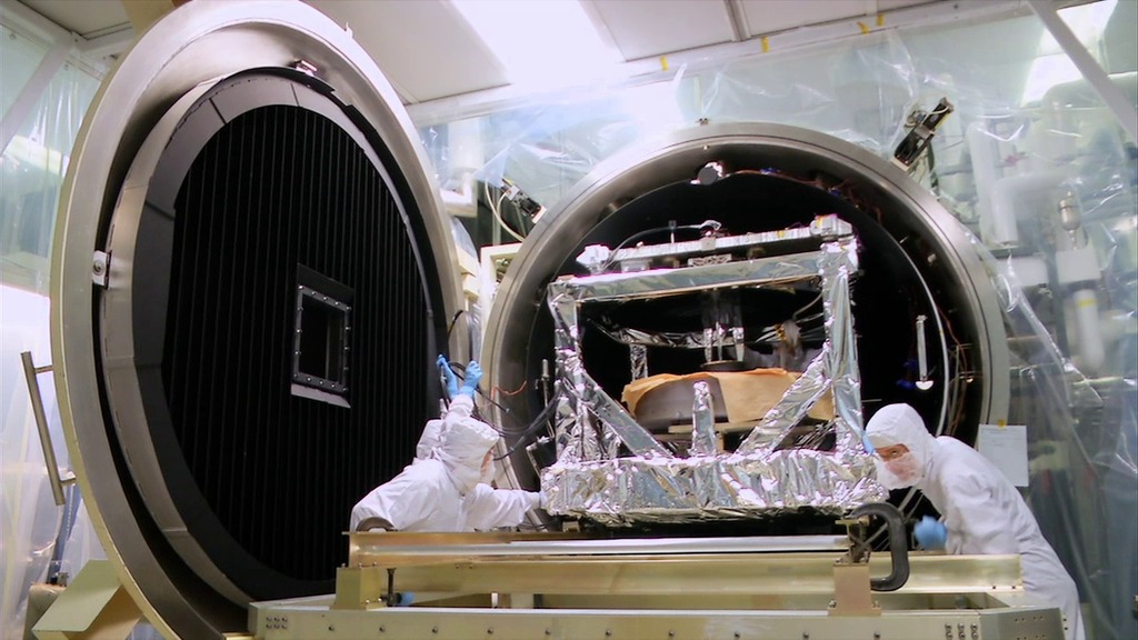 The Receiver Telescope Assembly exits the thermal vacuum chamber.