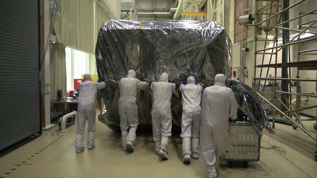 B-roll video for editors showing footage of engineers at NASA Goddard Space Flight Center placing Webb Telescope's ISIM into the Space Environment Simulator for it's final cryogenic test before integration into the telescope.  1080p/29.97