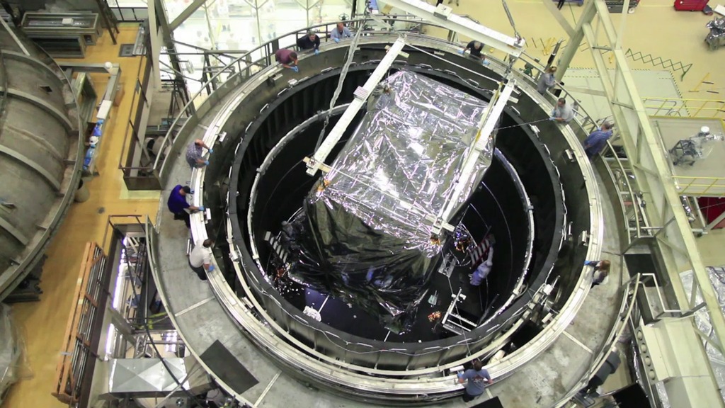 B-roll footage of engineers at NASA Goddard Space Flight Center placing Webb Telescope's ISIM into the Space Environment Simulator of it's final cryogenic test before integration into the telescope.  