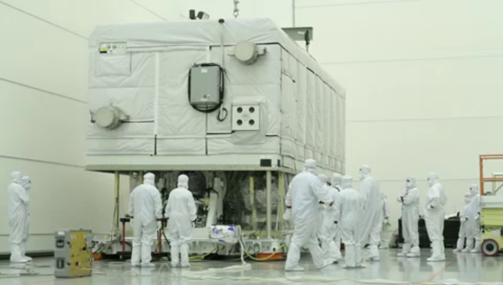 B-roll compilation of GOES-R spacecraft being unpacked and prepared for integration with its launch vehicle. This clean room is houses inside the Astrotech facility in Florida, near the Kennedy Space Center.