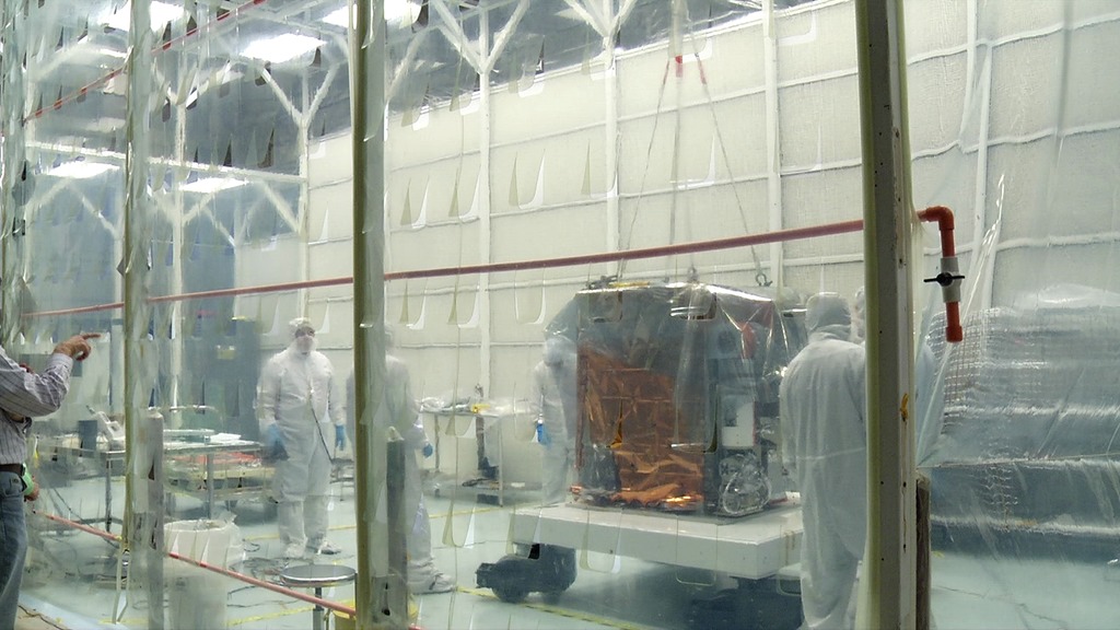 This time-lapse video of NICER's X-ray Timing Instrument (XTI) being lifted and integrated was taken on Dec. 23, 2015, in a clean-tent at NASA's Goddard Space Flight Center.