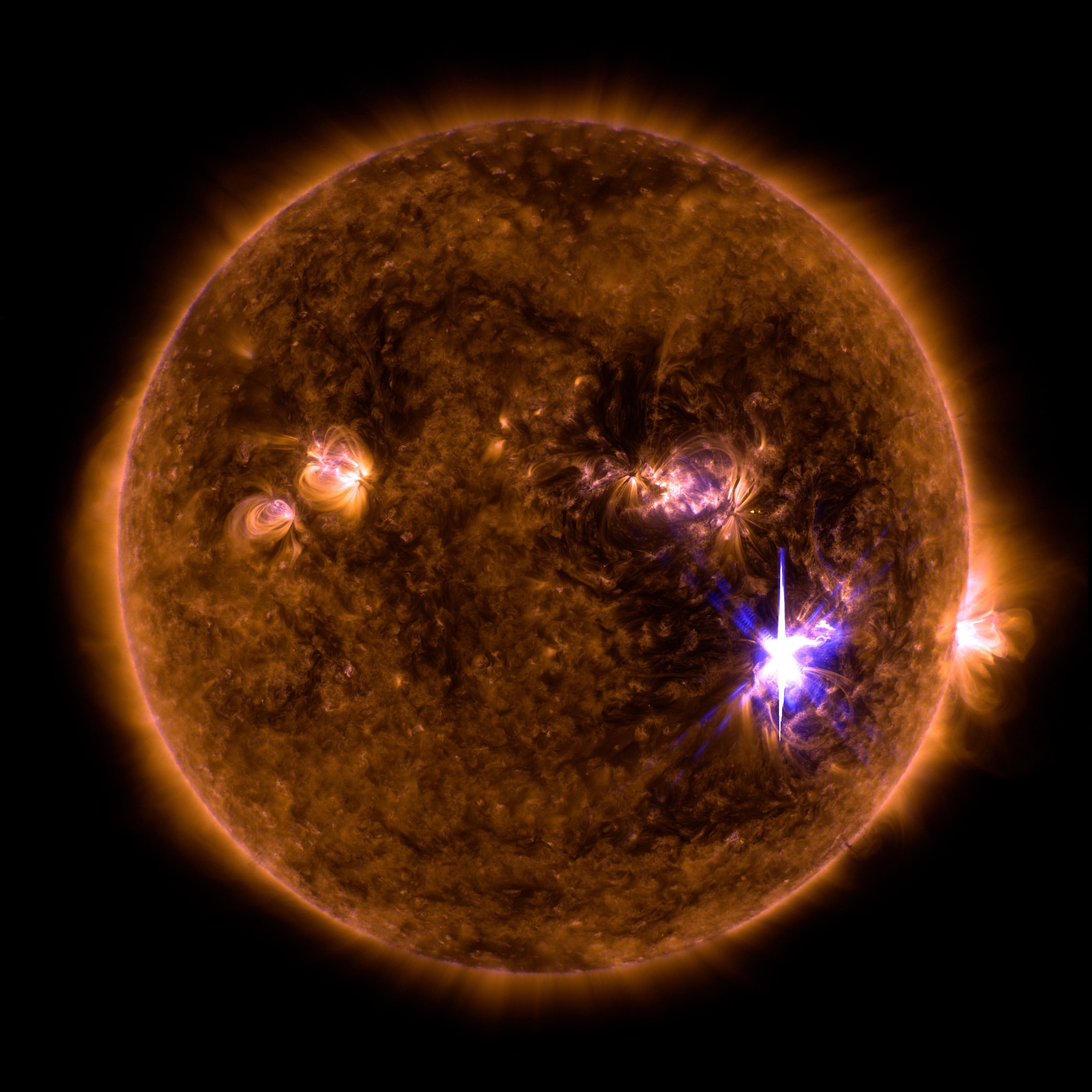 An X9.3 class solar flare flashes in the middle of the Sun on Sept. 6, 2017. This image was captured by NASA's Solar Dynamics Observatory and shows a blend of light from the 171 and 131 angstrom wavelengths.Credit: NASA/GSFC/SDO