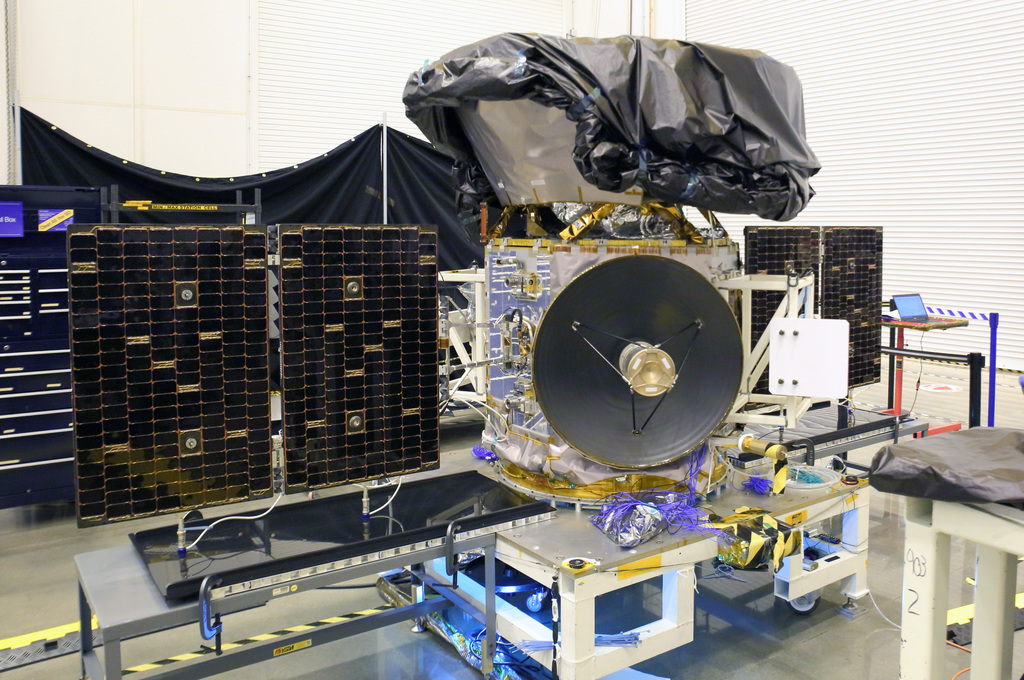 Photo of TESS spacecraft solar arrays being deployed for testing at Orbital ATK in Dulles, Va. 