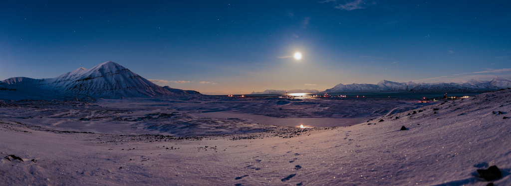 Moonlit landscape in Ny-Ålesund, Svalbard. Credit: NASA/Chris Pirner