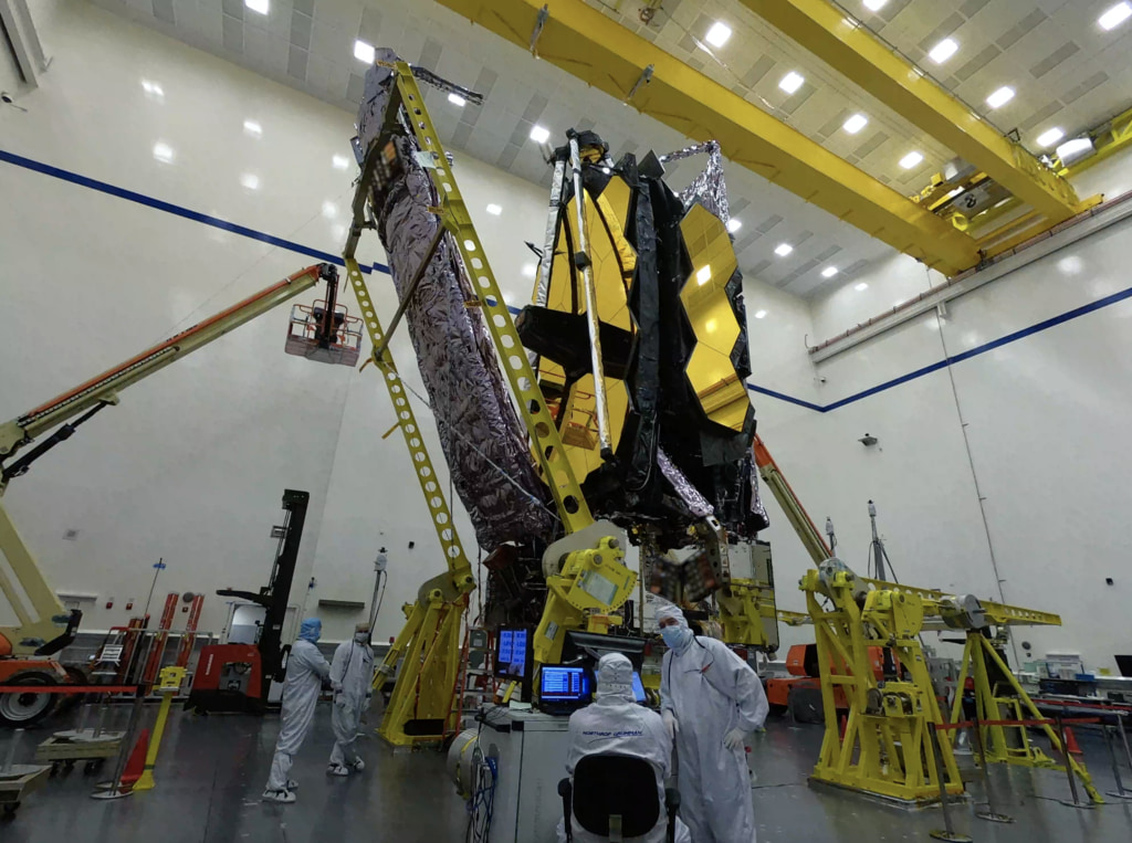 Backup time-lapse 1 of engineers stowing the James Webb Space Telescope's sunshield front UPS at Northrop Grumman in Redondo Beach, CA.  