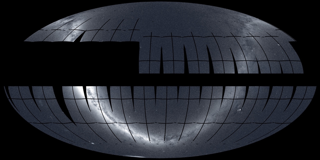 This plot combines the TESS northern and southern mosaics to show the extent of its primary mission survey. The yearlong southern panorama (bottom) was completed in July 2019, and the northern imaging was completed in July 2020.  The prominent glowing band is the Milky Way, our galaxy seen edgewise. The ecliptic &ndash; the plane of Earth's orbit and the apparent yearly path of the Sun through the stars &ndash; runs straight across the middle of the map. Credit: NASA/MIT/TESS and Ethan Kruse (USRA)