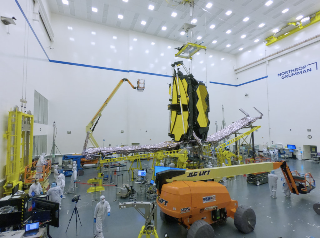 GoPro time-lapse footage of engineers performing the final deployment of the James Webb Space Telescope's deployable tower assembly (DTA) at Northrop Grumman in Redondo Beach, CA.  