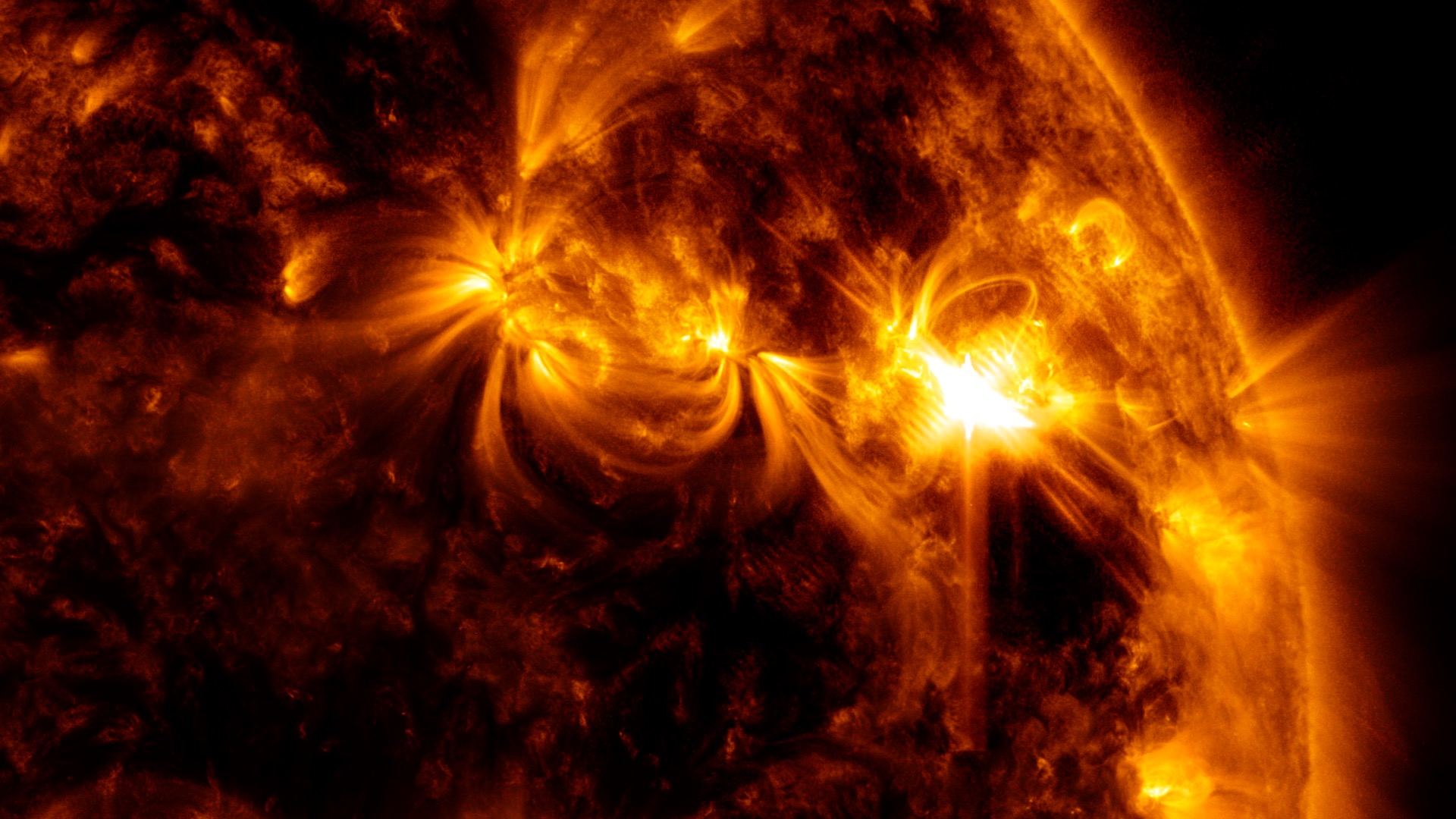 This is a close-up image captured by NASA’s Solar Dynamics Observatory of today’s solar flare.  The image shows a a blend of 131 and 171 angstrom extreme ultraviolet light that highlights the extremely hot material in flares.Credit: NASA/GSFC/SDO