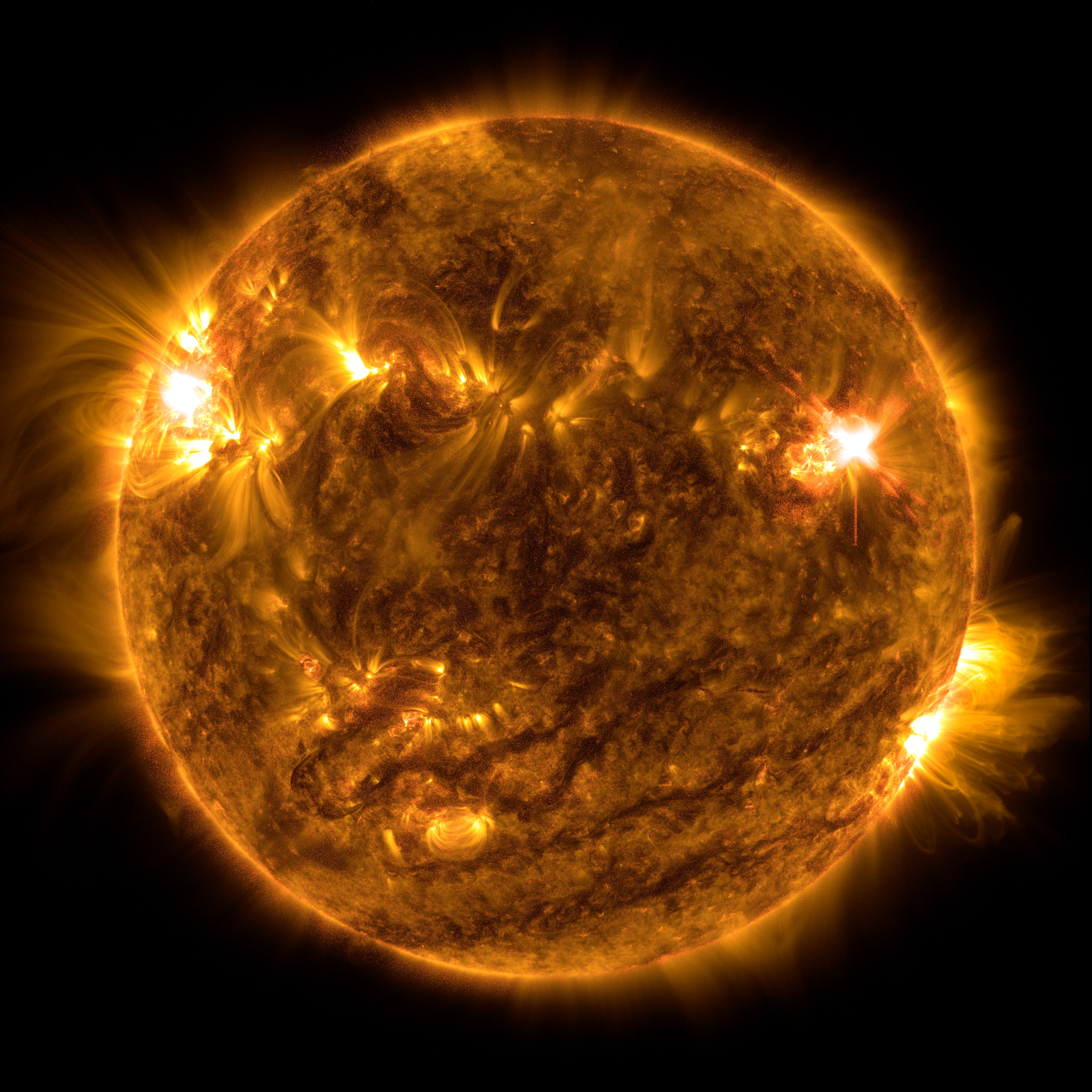 An X1.0 class solar flare flashes on the right edge of the Sun on October 2, 2022. This image was captured by NASA's Solar Dynamics Observatory and shows a blend of light from the 171 and 304 angstrom wavelengths.Credit: NASA/GSFC/SDO