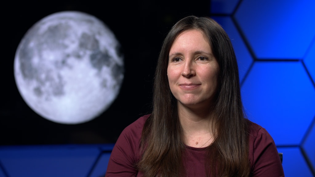 Dr. Kelsey Young is the Artemis Science Flight Operations Lead and works at NASA’s Goddard Space Flight Center in Greenbelt, Maryland.

Complete transcript available.

Dr. Young discusses the JETT5 mission, which was conducted May 13-17. During JETT5, astronauts performed a series of simulated moonwalks in the San Francisco Volcanic Field near Flagstaff, Arizona, while flight controllers and scientists at NASA’s Johnson Space Center in Houston, Texas guided and provided feedback on their progress. JETT5 was designed to prepare crew members for the historic Artemis III mission that will land near the Moon’s south pole.

00:00:00:00 – What is your role in NASA’s Artemis missions?
00:00:58:03 – What was the JETT5 mission, and what activities did it include?
00:01:49:03 – Why are mission simulations like JETT5 critical?
00:02:32:20 – Why was Arizona chosen as the site of the JETT5 field test?
00:03:44:18 – Why were the field tests conducted both in daytime and at night?
00:04:39:13 – Where were Mission Control team members and scientists located?
00:05:21:26 – What is the Science Evaluation Room for the Artemis missions?
00:06:10:17 – What are the activities and roles within the Science Evaluation Room?
00:06:49:00 – What science payloads will the Artemis crew deploy on the lunar surface?
00:07:22:28 – What goes into creating a scientifically well-trained crew member?

