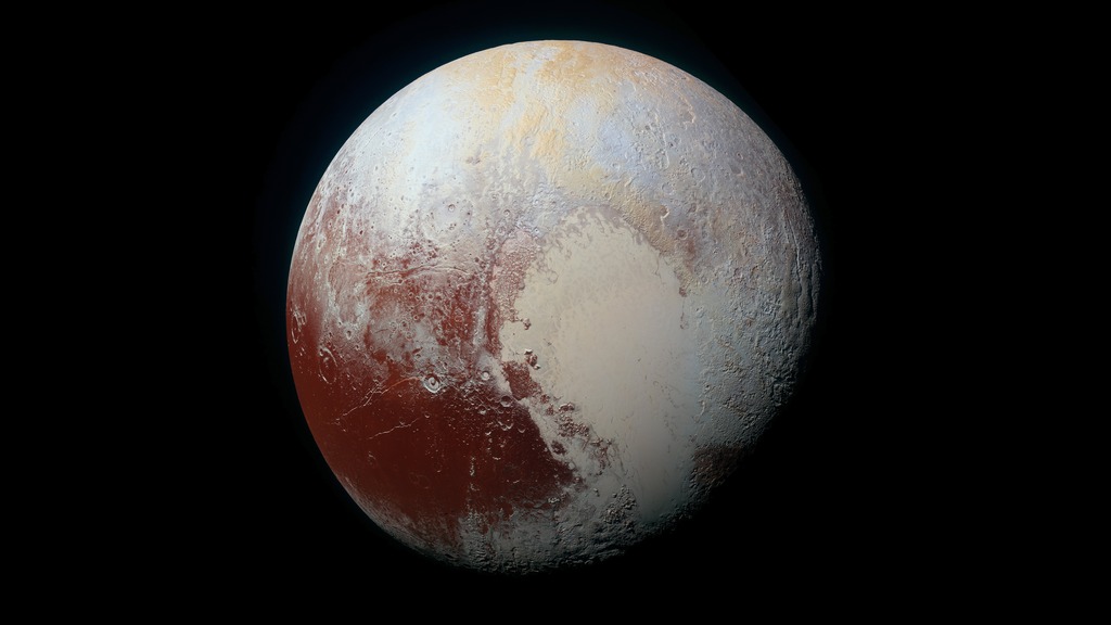 An enhanced view of Pluto shows color variations across the surface