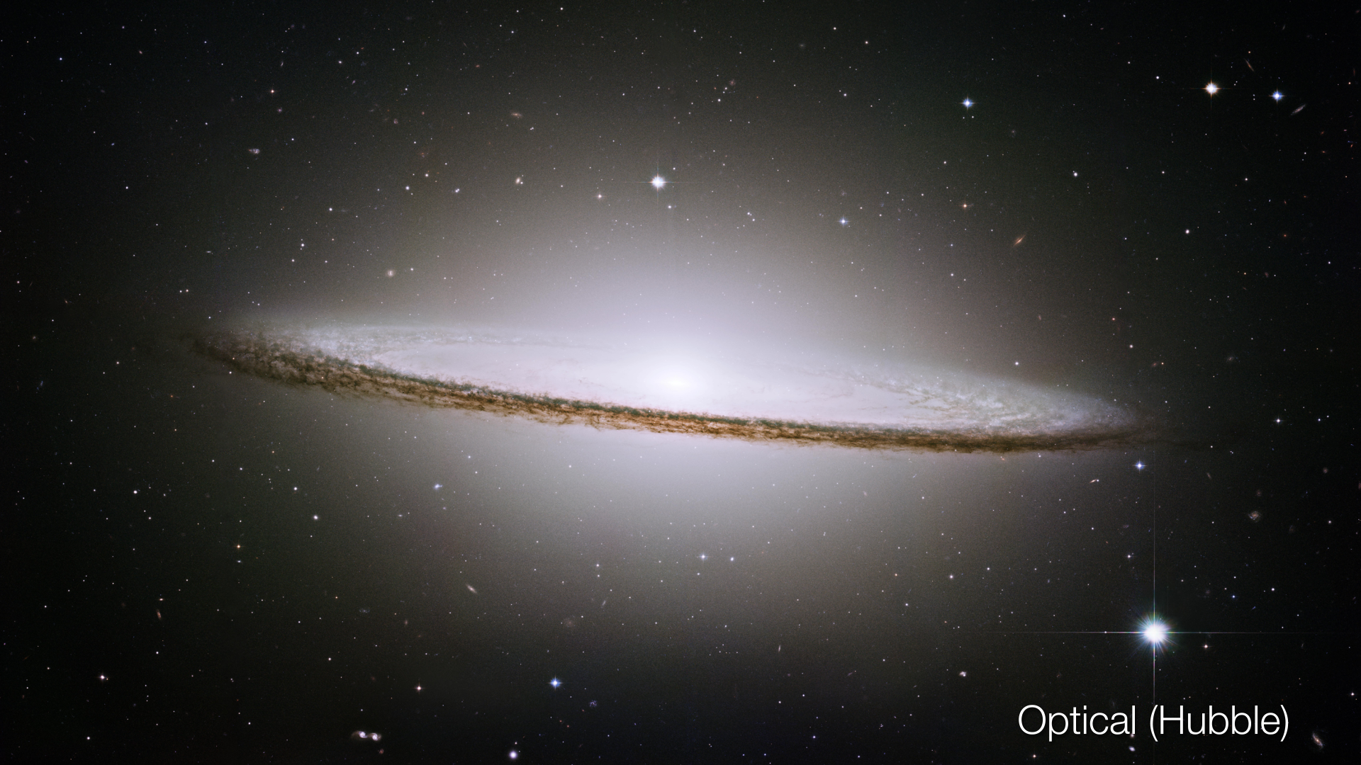 Hubble optical image of Sombrero Galaxy The dust ring is partially hidden in the galaxy's visible-light glow.